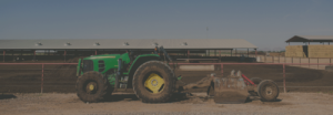 Tractor pulling a plow