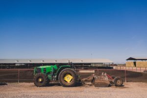 Tractor pulling a plow