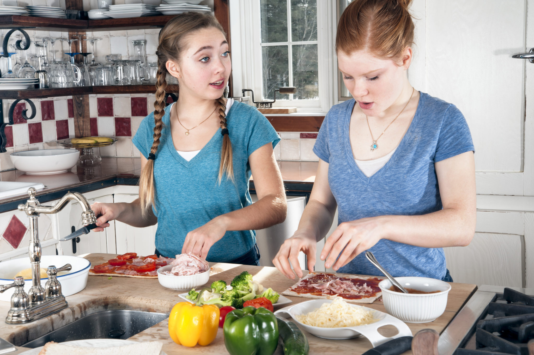 Two Teenagers Making Pizza In Modern Kitchen Arizona Milk Producers 