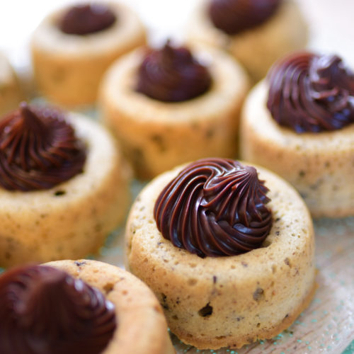 small vanilla cookie cups filled with chocolate fudge