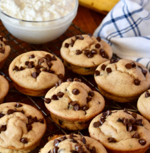 a basket of fresh blended cottage cheese muffins with chocolate chips